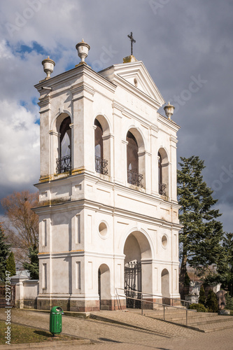 Obraz na płótnie Historic brick belfry in Warszawice, Masovia, Poland w salonie