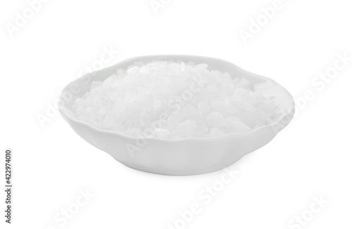 Plate with natural sea salt isolated on white