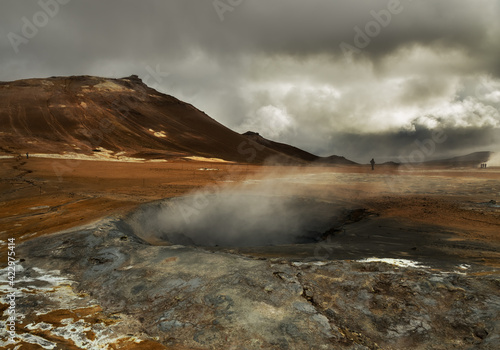 Valley with geothermal springs and geysers. Fantastic view of the hills and the current hot springs. Geothermal zones a Naumafjal Hverir in the north-eastern part of Iceland. 