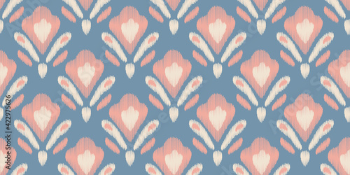 Ikat vector seamless pattern in modern Bohemian style. Ogee textile design