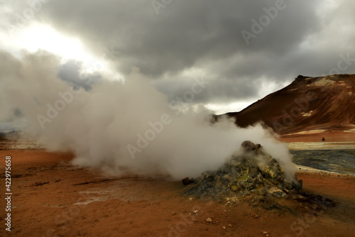 Valley with geothermal springs and geysers. Fantastic view of the hills and the current hot springs. Geothermal zones a Naumafjal Hverir in the north-eastern part of Iceland. 