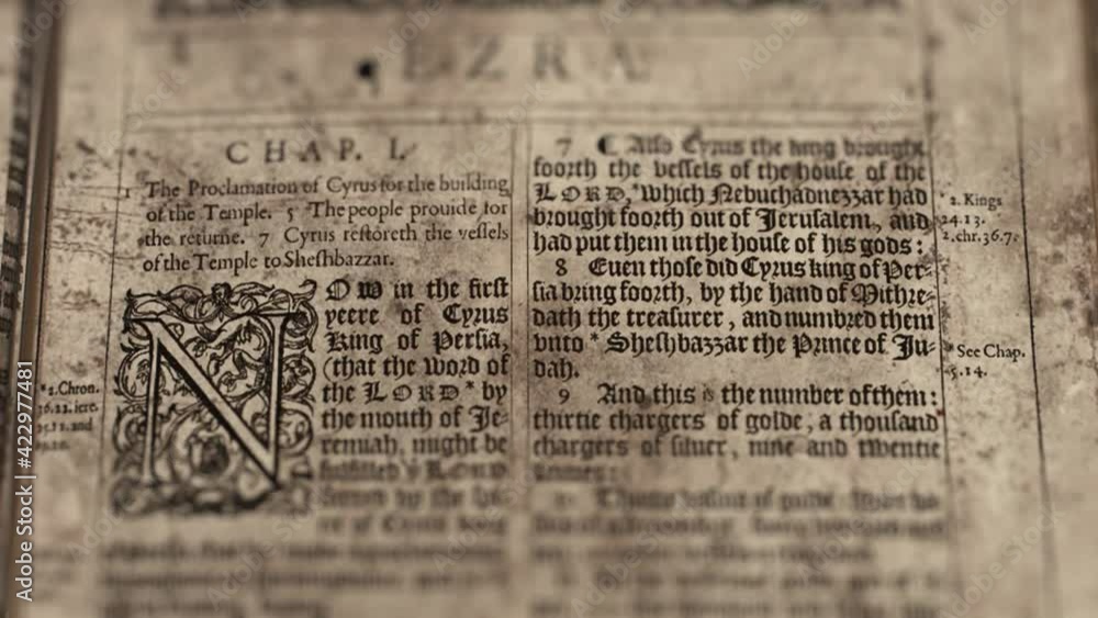 Ezra - Slider Shot, Old Paper Bible, King James Bible Ezra - Slider Shot, Old Paper Bible, King James Bible