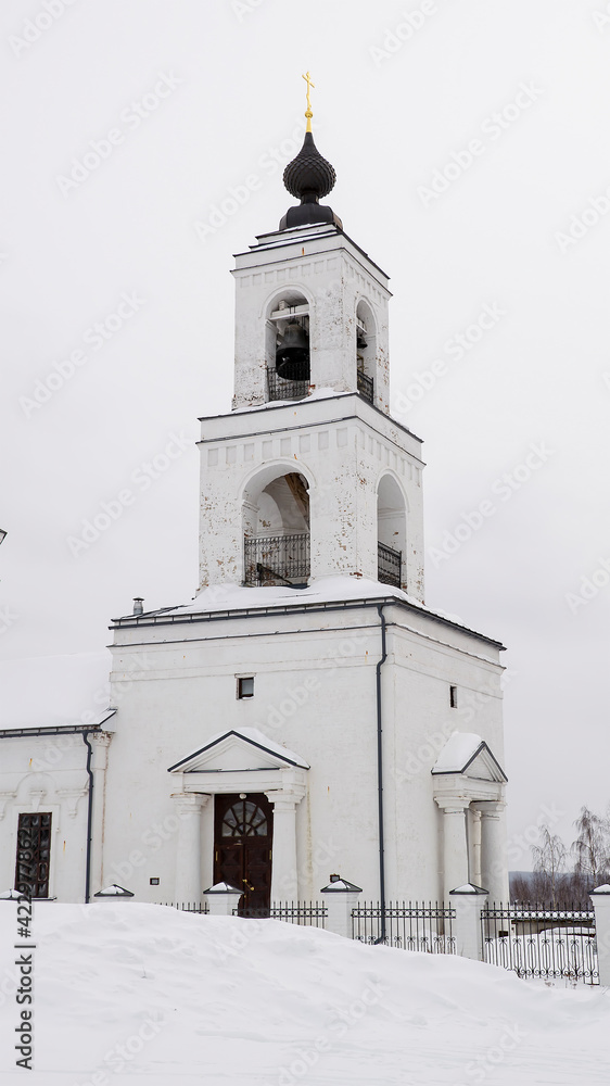 white brick bell tower of an orthodox church