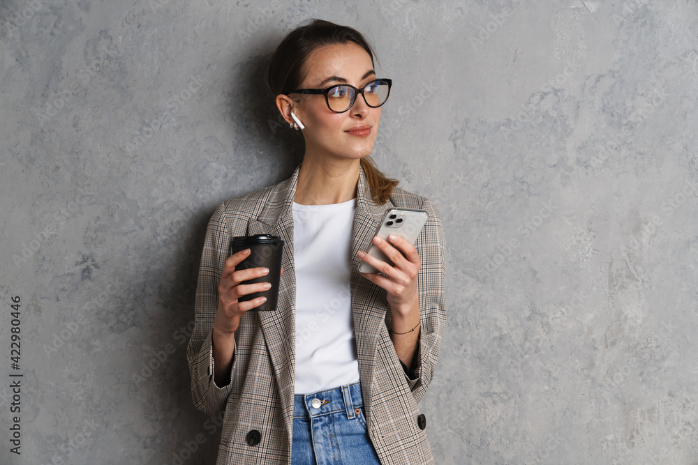 Fototapeta premium Attractive confident young woman in basic jacket