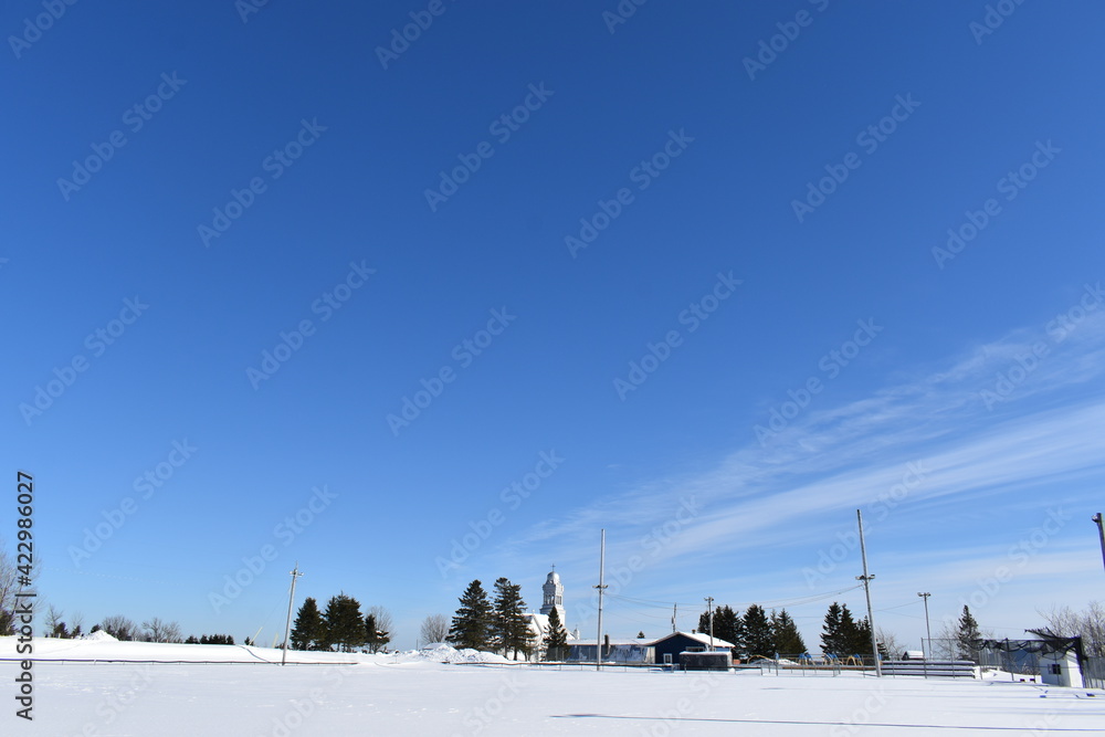 The recreation ground under a blue sky, Sainte-Apolline, Québec