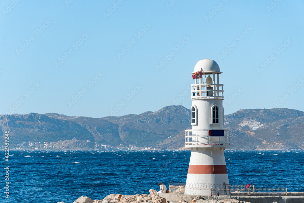 Lighthouse in fishing port Kas town, Turkey.