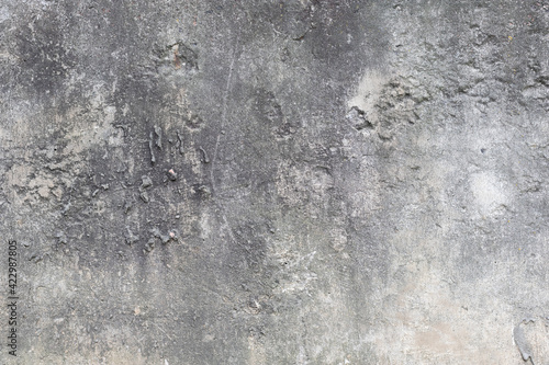 Old dirty spotty concrete wall.