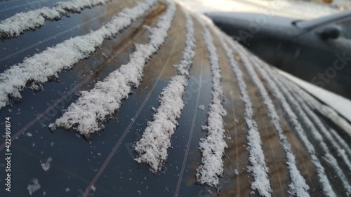 lines of the snowflakes between window defroster lines of rear window in the winter cold weather 