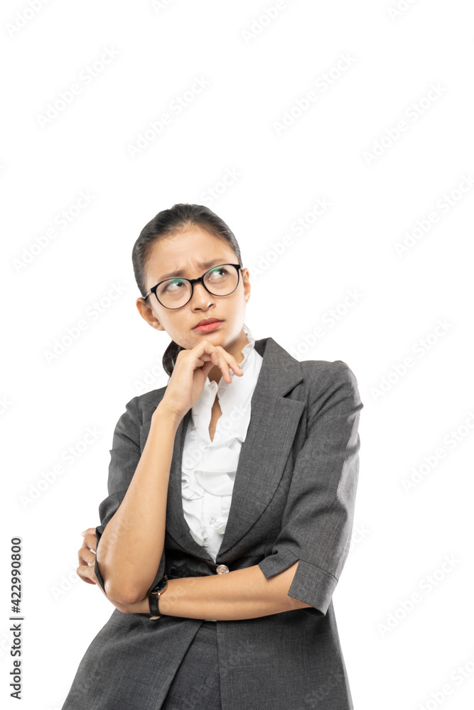 Portrait of a pensive asian business woman looking away isolated over white background Portrait of a pensive asian business woman looking away isolated over white background
