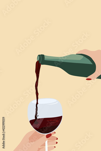 The girl pours herself wine into a glass. Drink wine in the evening, after a hard day's work. The girl is drinking wine.