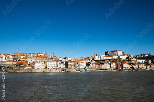 Porto, Portugal Old city skyline from across the Douro river on a Sunny warm day