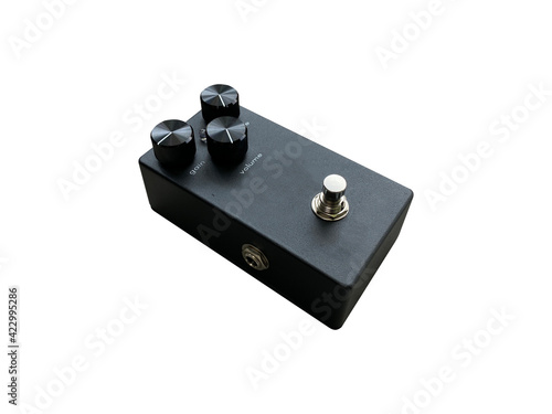 Isolated black sand texture overdrive and black knob stompbox electric guitar effect on white background with clipping path. music concept. can use for flat lay graphic or promotion.