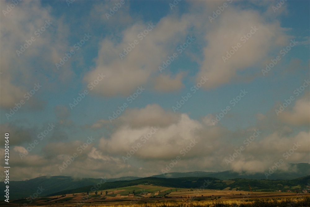 clouds over the field