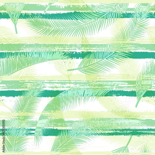 Stylish coconut palm leaves tree branches over