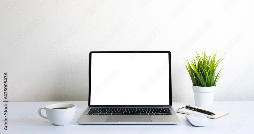 Laptop computer blank screen on white office desk table with coffee cup and notebook, mouse computer with equipment office supplies. Business and finance concept. Workplace, Flat lay with copy space. Laptop computer blank screen on white office desk table with coffee cup and notebook, mouse computer with equipment office supplies. Business and finance concept. Workplace, Flat lay with copy space.