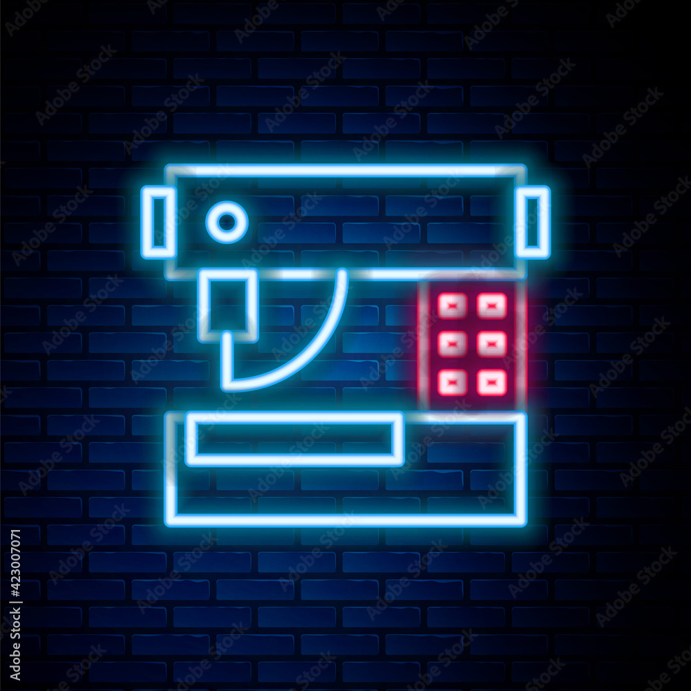 Glowing neon line Sewing machine icon isolated on brick wall background. Colorful outline concept. Vector