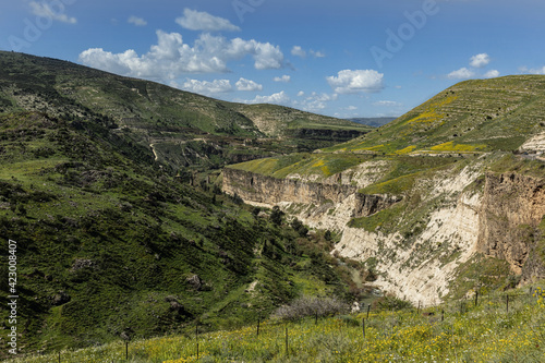 View of Jordan across the Yarmouk River from Israel photo