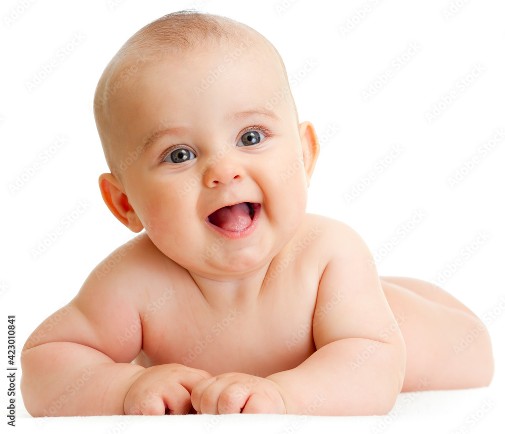 Adorable baby boy lying isolated