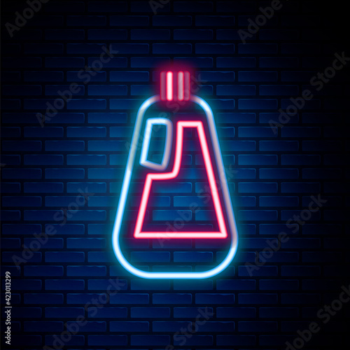 Glowing neon line Plastic bottle for liquid laundry detergent, bleach, dishwashing liquid icon isolated on brick wall background. Colorful outline concept. Vector