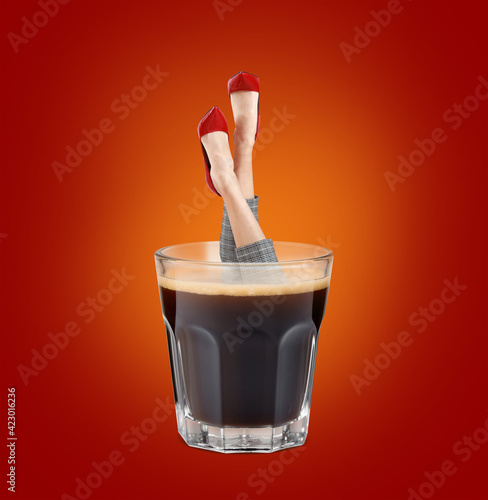 Glass of hot espresso on wh...