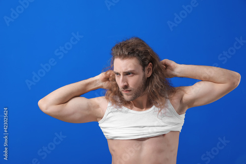 Handsome young man on color...