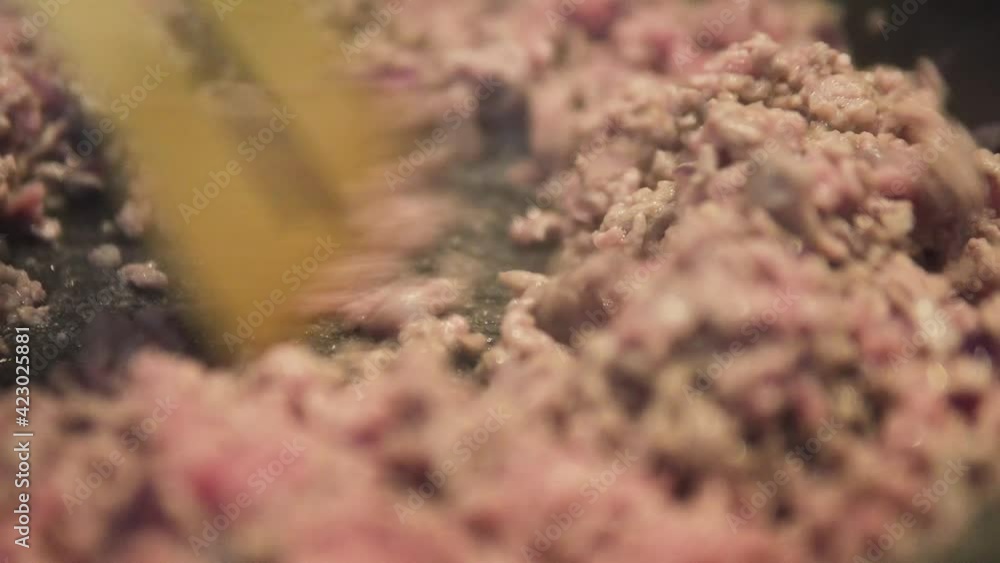 minced meat cooking in pan with onions close up minced meat cooking in pan with onions close up