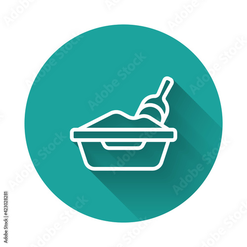 White line Cat litter tray with shovel icon isolated with long shadow background. Sandbox cat with shovel. Green circle button. Vector