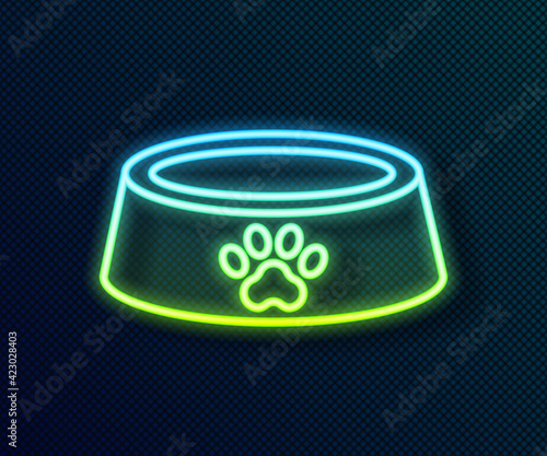 Glowing neon line Pet food bowl for cat or dog icon isolated on black background. Dog or cat paw print. Vector