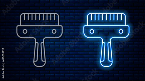 Glowing neon line Hair brush for dog and cat icon isolated on brick wall background. Brush for animal fur. Pet accessory. Vector
