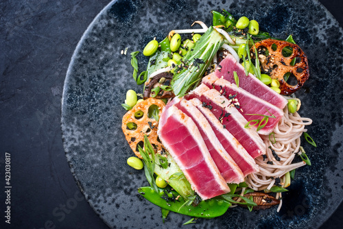 Fotografie Modern style traditional Japanese gourmet seared tuna fish steak tataki with sob