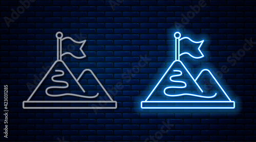 Glowing neon line Mountains with flag on top icon isolated on brick wall background. Symbol of victory or success concept. Goal achievement. Vector
