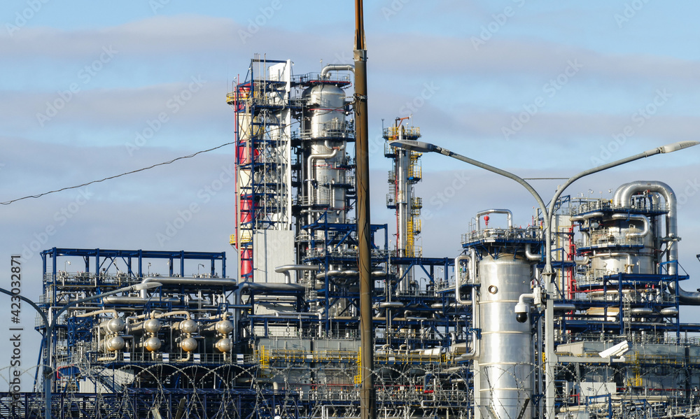 Corps of Moscow refinery in spring in clear weather Corps of Moscow refinery in spring in clear weather