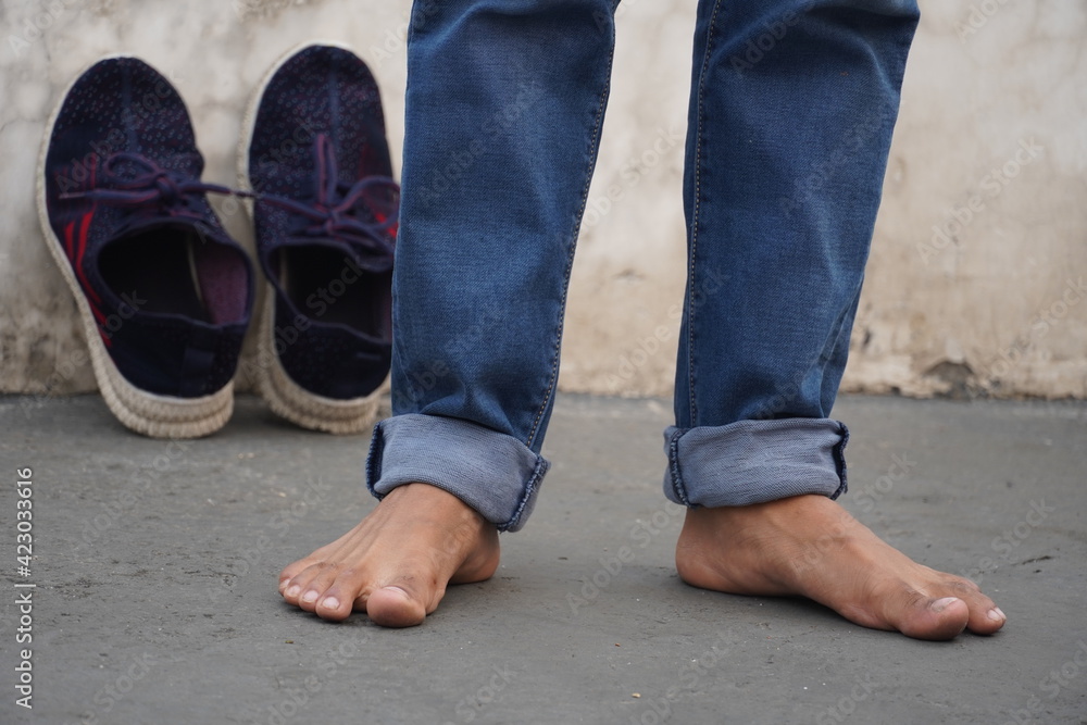 a leg and shoe image Poor concept a leg and shoe image Poor concept