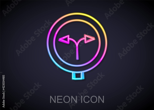 Glowing neon line Fork in the road icon isolated on black background. Vector