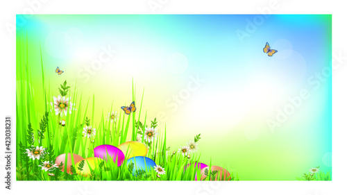 Spring Natural Background With Easter Eggs, fresh green grass and little butterflies. 