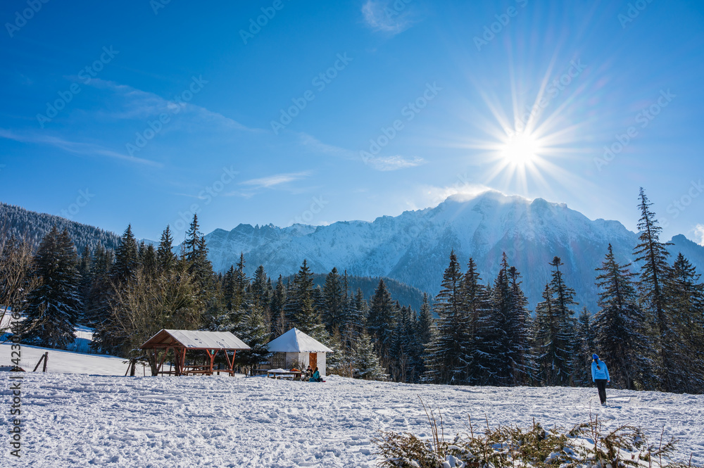 Hiking in the snowy Romanian Carpathians in winter