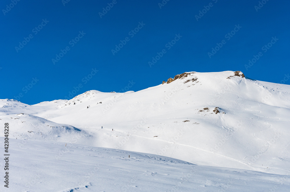 Untouched alpine skiing area in Romanian mountains with lots of snow