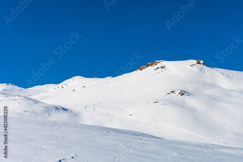 Untouched alpine skiing area in Romanian mountains with lots of snow