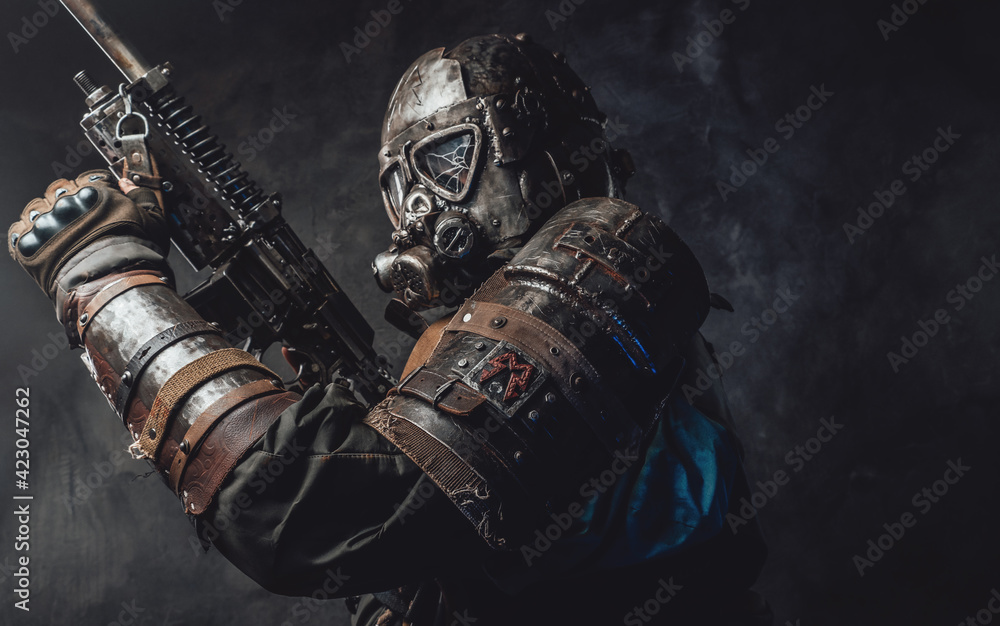 Εκτύπωση καμβά Survivor with custom armour and gun in dark background