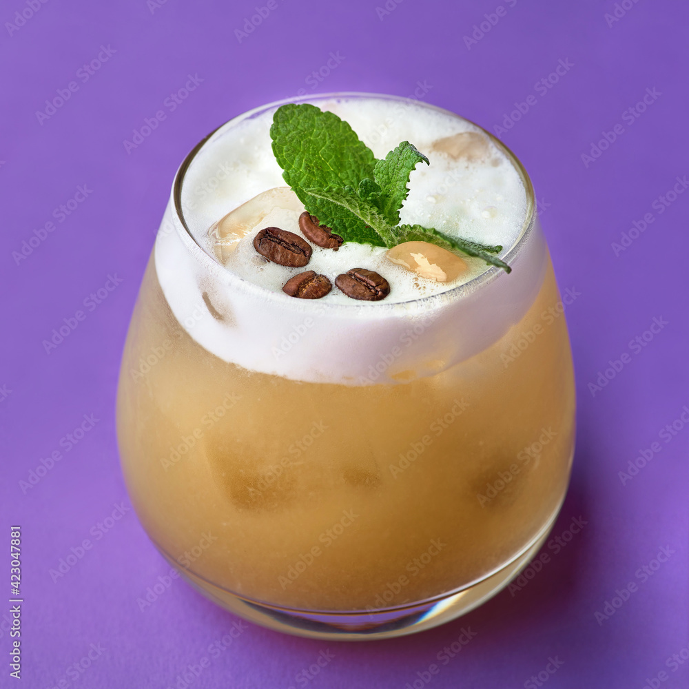Cocktail with coffee liqueur and coffee beans. Cocktail with coffee liqueur and coffee beans.