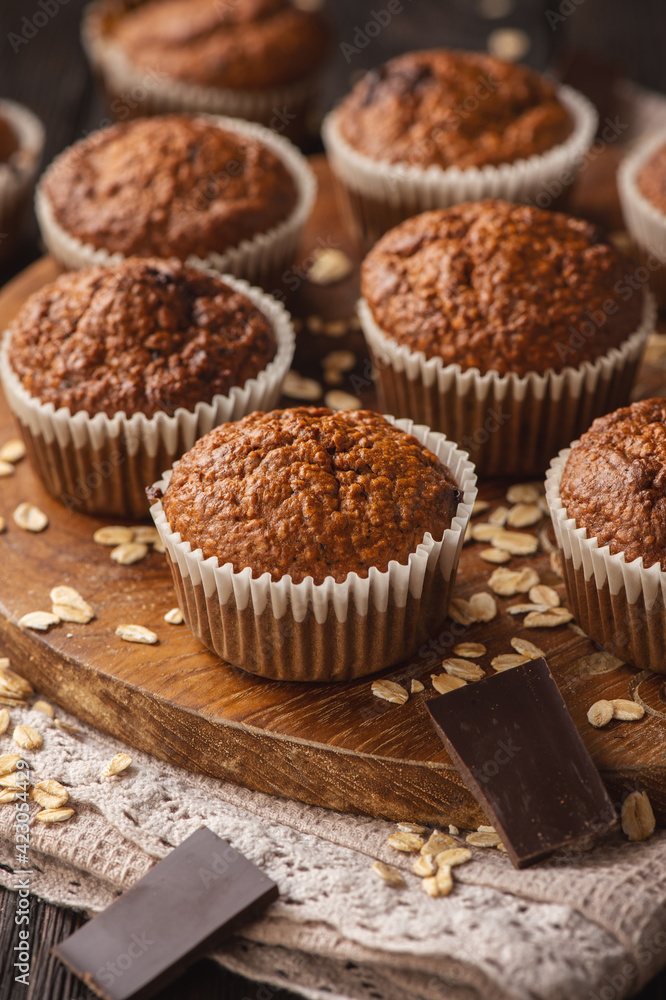 Homemade oat flakes muffins with peanut butter and chocolate. Homemade oat flakes muffins with peanut butter and chocolate.