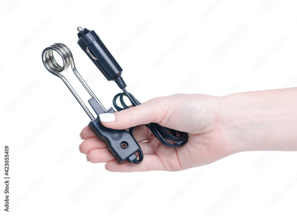 Car boiler for a cup in hand on white background isolation Car boiler for a cup in hand on white background isolation