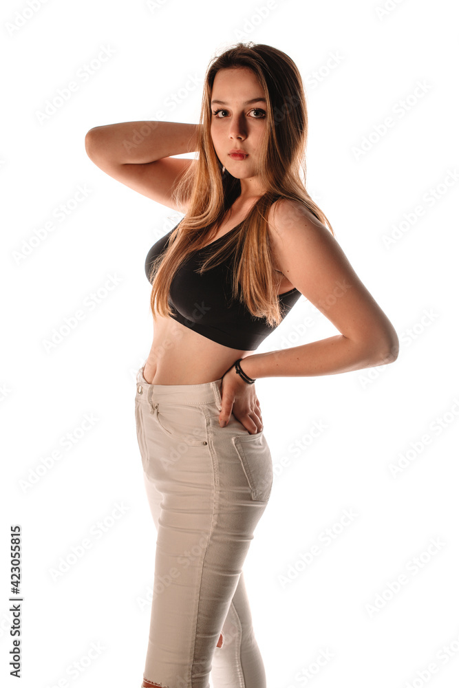 Young casual woman style portrait isolated over white background Young casual woman style portrait isolated over white background