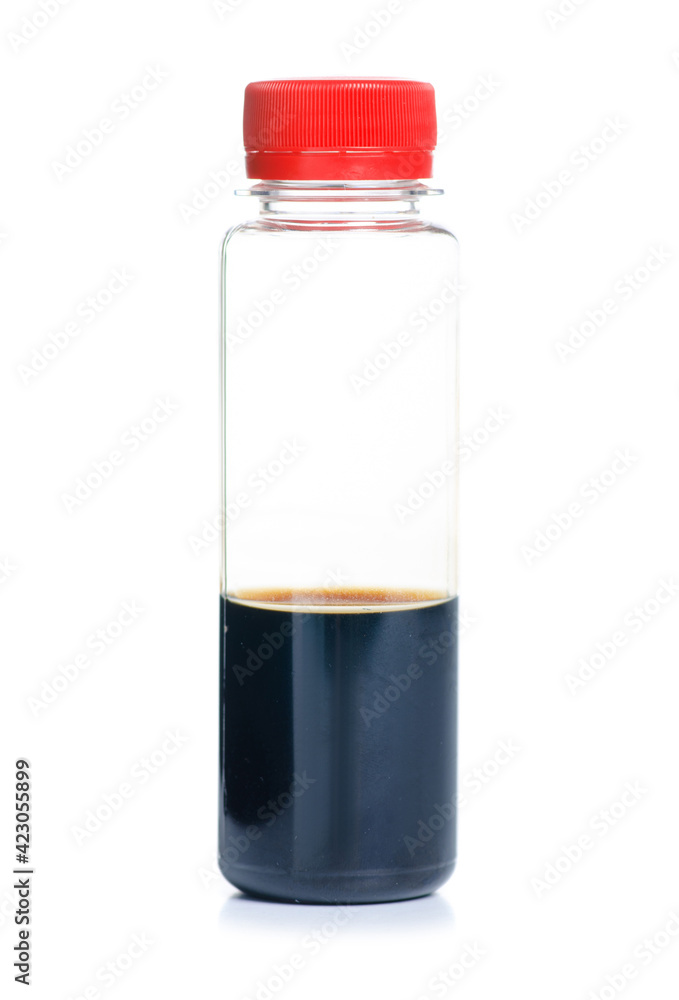 Bottle with soy sauce on white background isolation Bottle with soy sauce on white background isolation