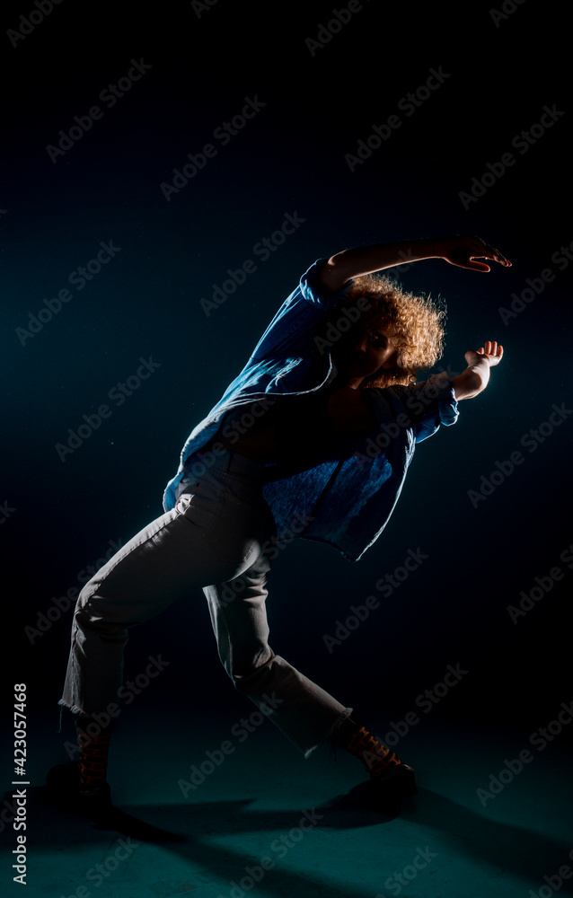 Choreographic dance in dark studio Choreographic dance in dark studio