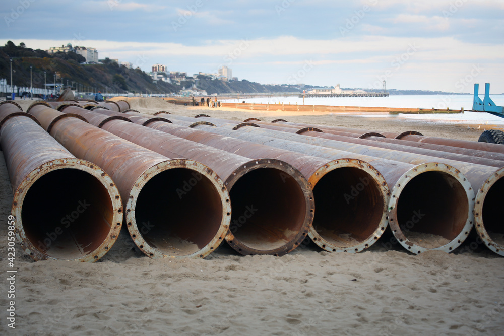 Large Iron Pipes on Bournemouth Beach Large Iron Pipes on Bournemouth Beach