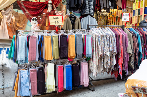 Arab store selling a variety of fabrics, Fabric in rolls © milanchikov
