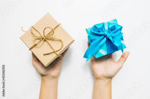 Fototapeta Naklejka Na Ścianę i Meble -  hand giving decorated present box