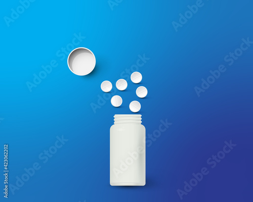Bottle and scattered pills on color background.