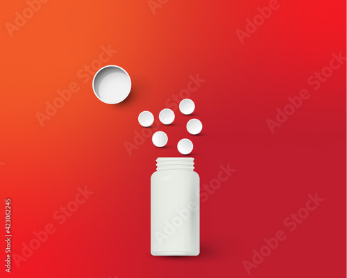 Bottle and scattered pills on color background.